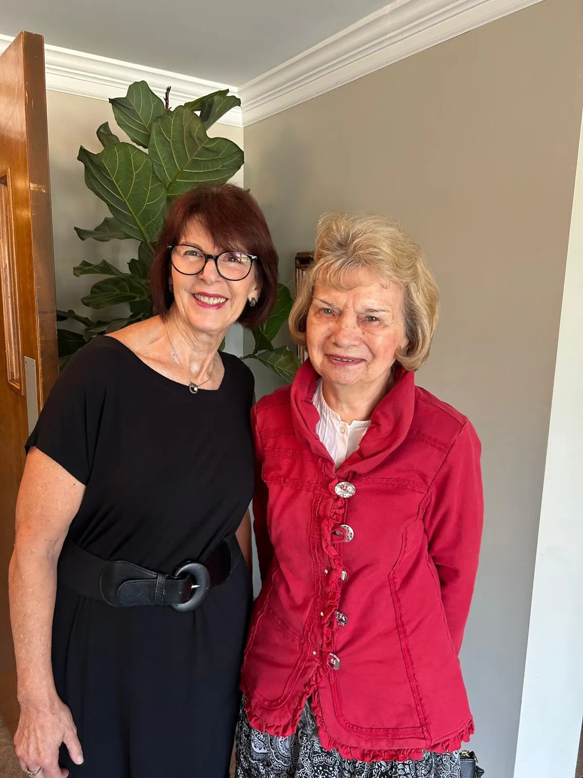 Two women smiling together at Open Arms Church